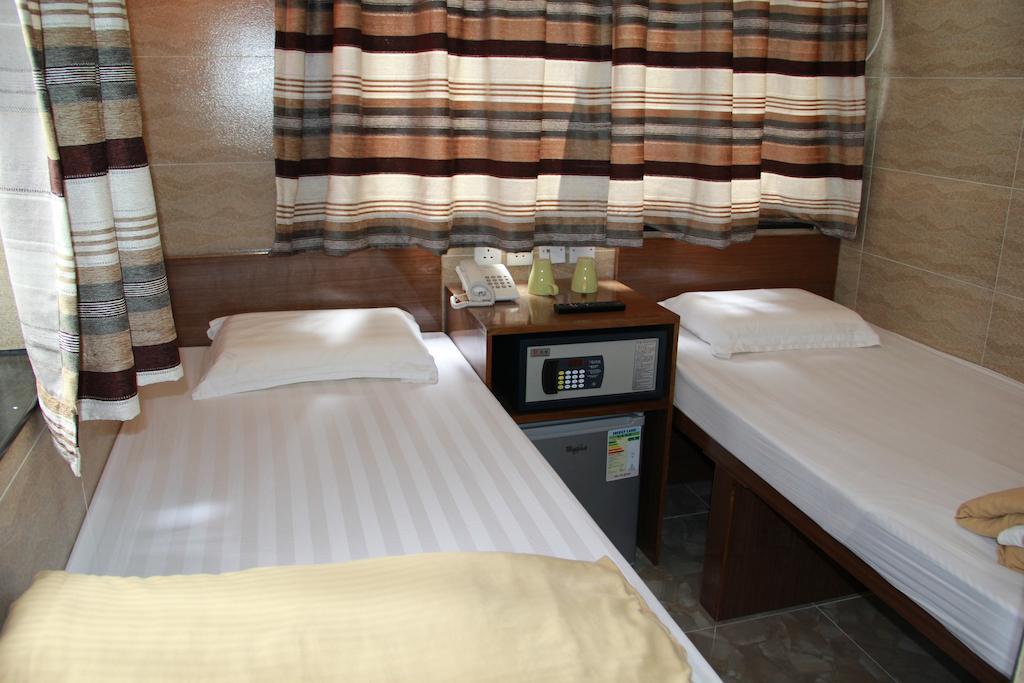 Everest Inn Guest House Гонконг Номер фото